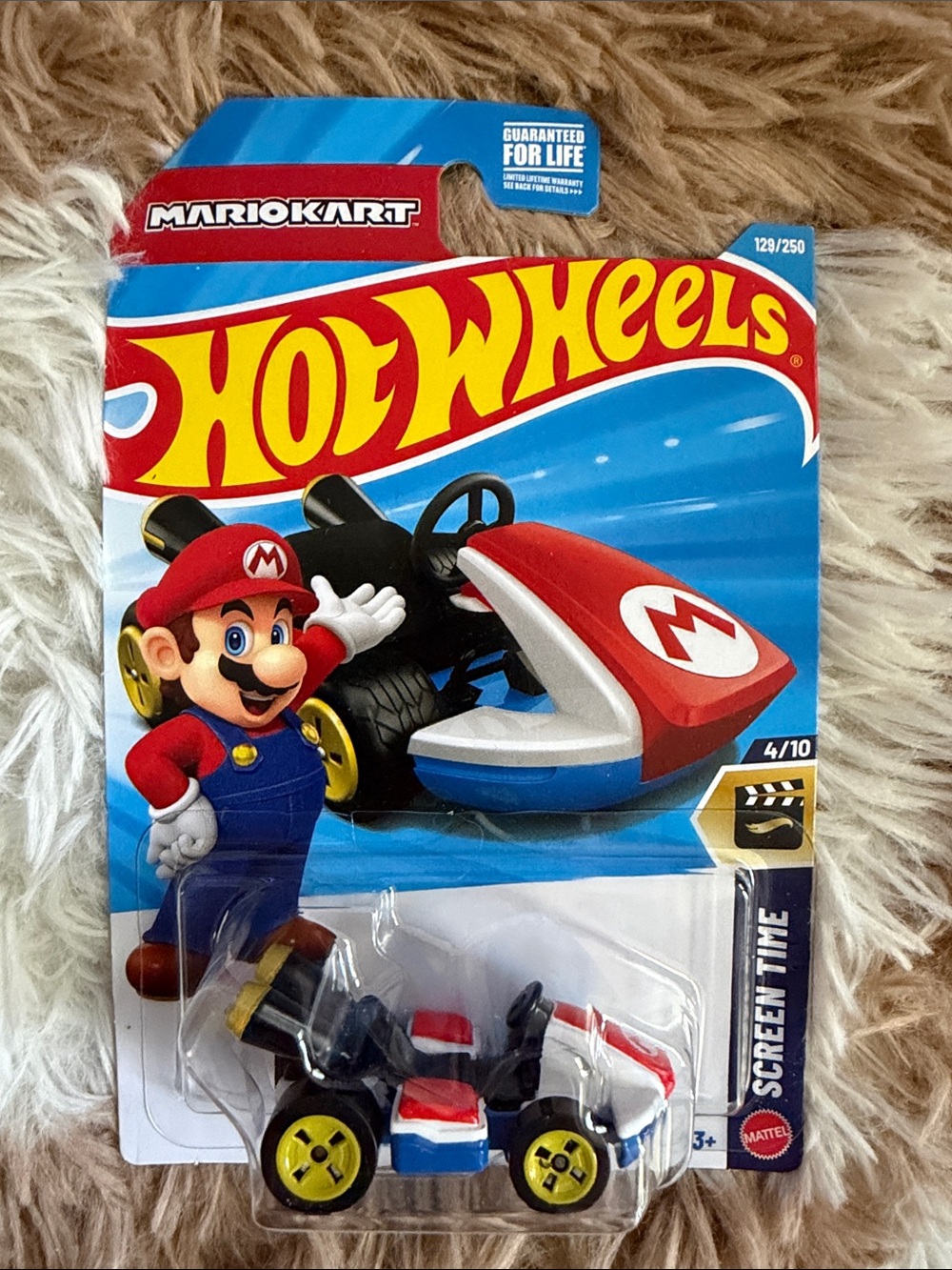 Mattel Hot Wheels Mario Kart Toy Car in Red, White, Blue